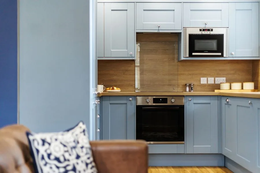 Contemporary blue shaker kitchen in a privately owned Bournemouth holiday apartment